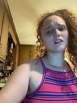 RedHeadZoe naked stripping on cam for live sex video chat