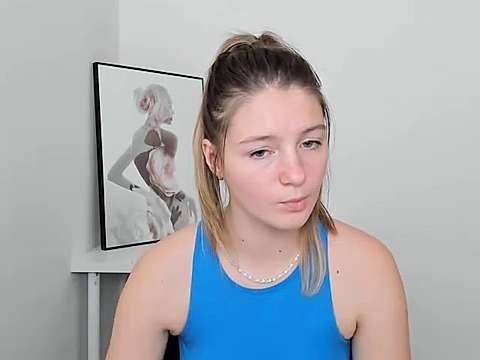 Ameli-Kiss naked stripping on cam for live sex video chat