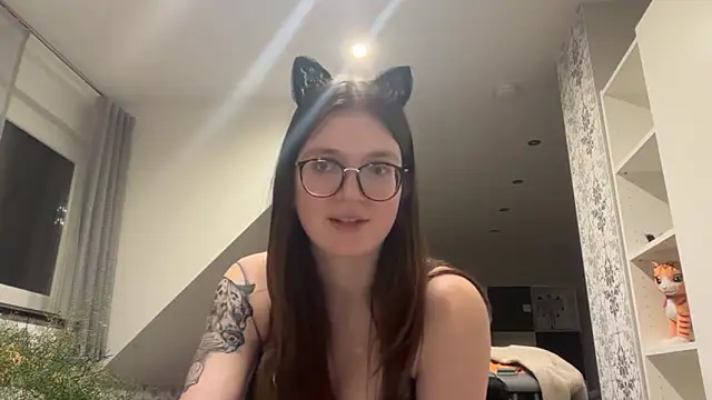 NikaCyberslut naked stripping on cam for live sex video chat